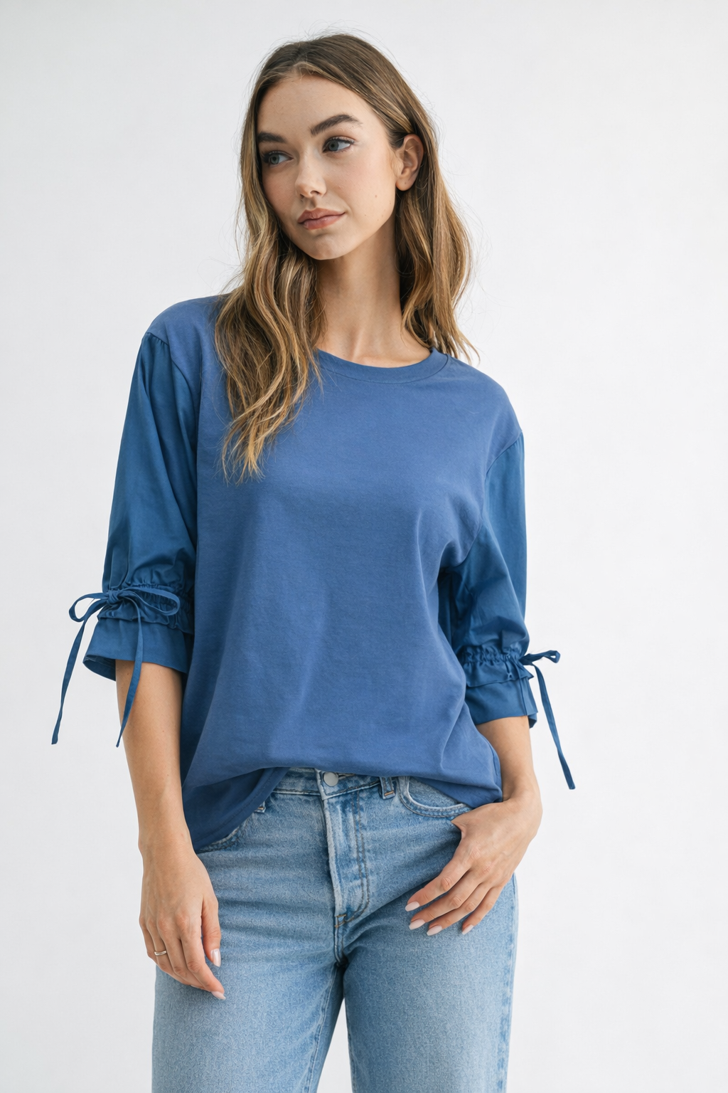 Reida Stretch Pointe Knit Top