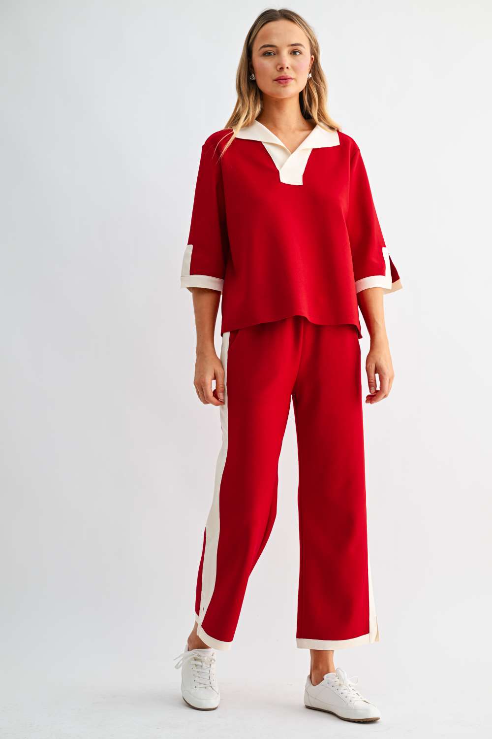 Women’s red wide-leg pants with cream side stripe and contrast hem trim