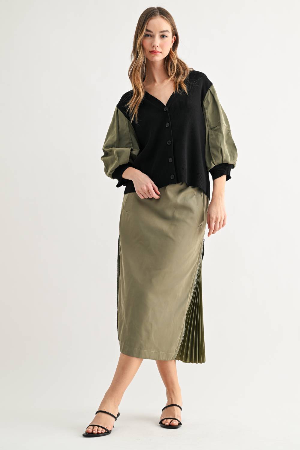 Simon olive and black balloon sleeve cardigan styled with matching skirt