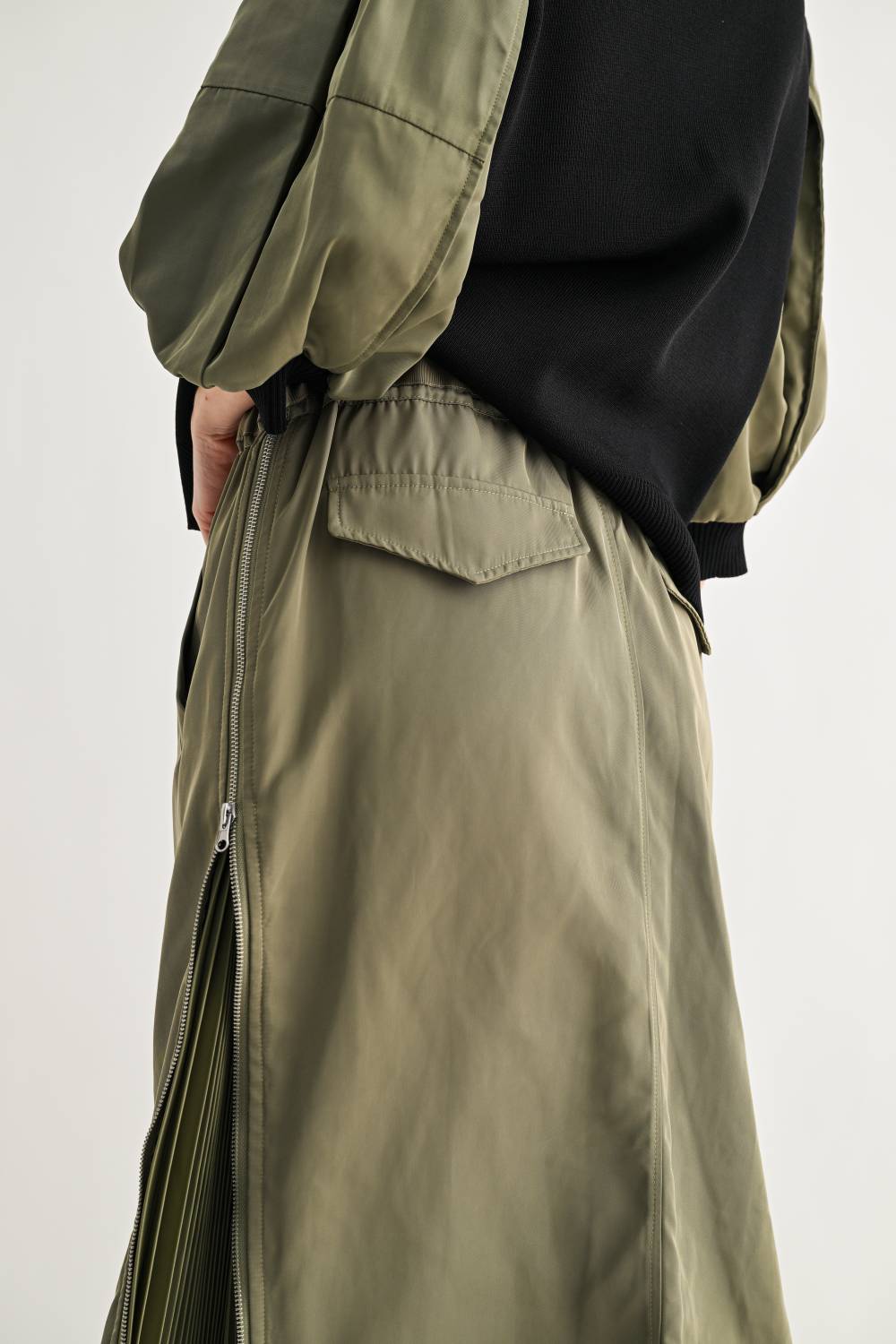 Back view of Simon olive and black woven cardigan