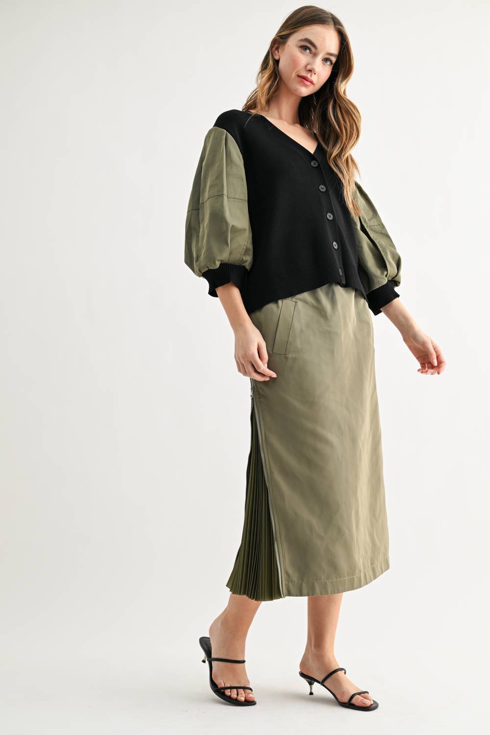 Side view of Simon olive and black contrast sleeve cardigan