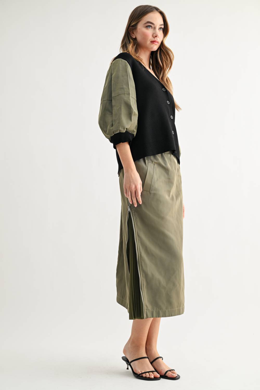 Side view of Simon olive and black contrast sleeve cardigan