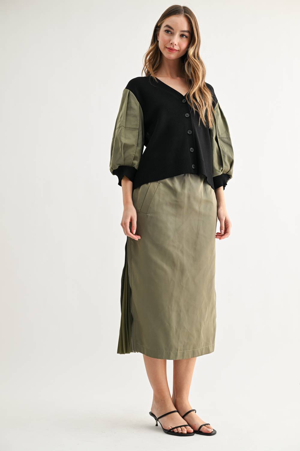 Side view of Simon olive and black contrast sleeve cardigan