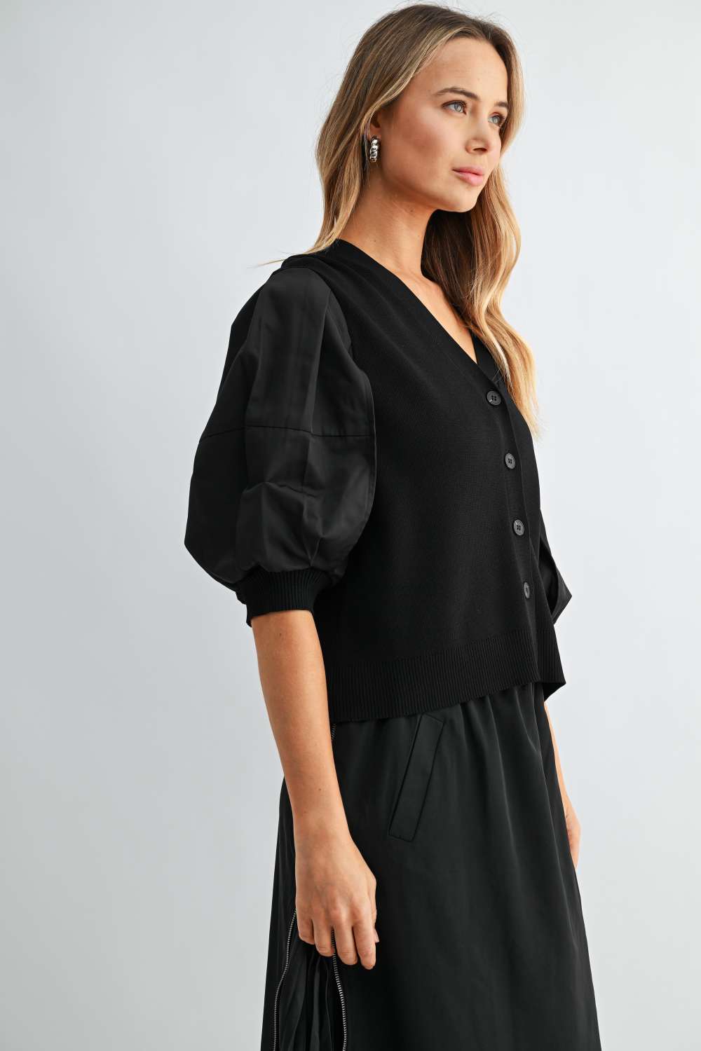 Side view of Simon black woven balloon sleeve cardigan