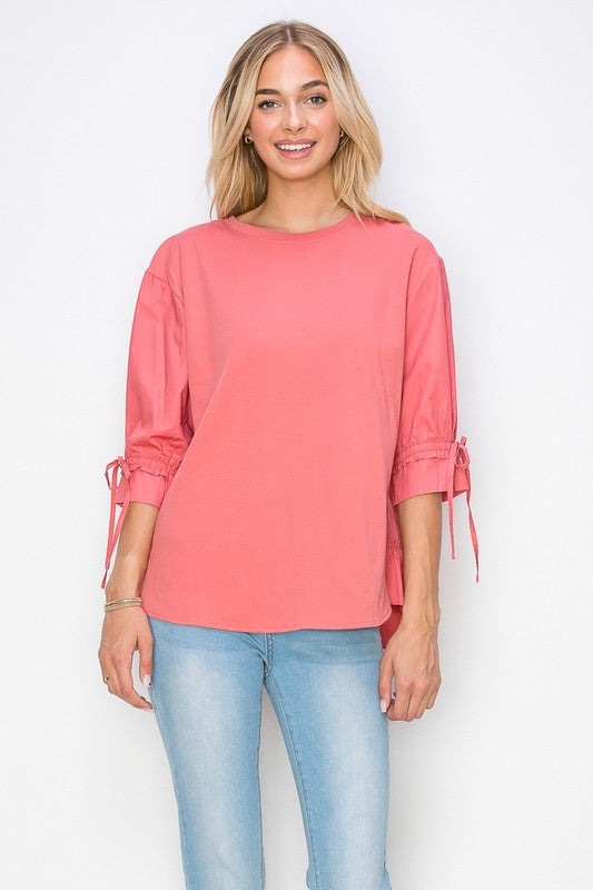 Reida Stretch Pointe Knit Top