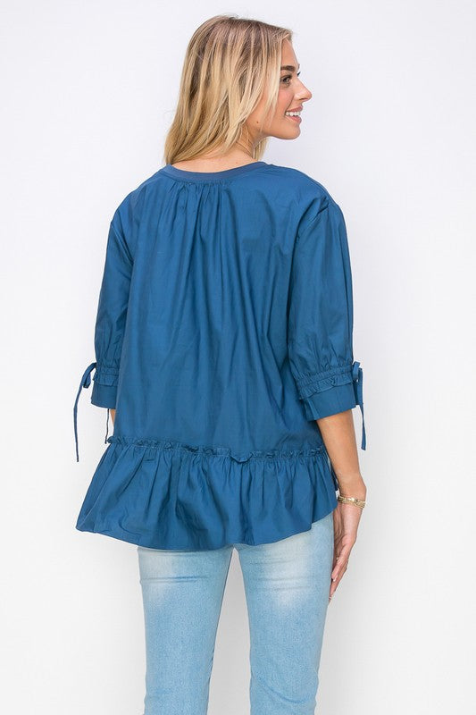 Reida Stretch Pointe Knit Top
