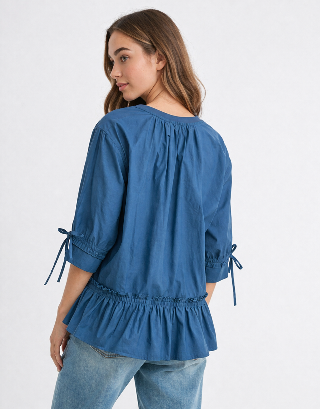 Reida Stretch Pointe Knit Top