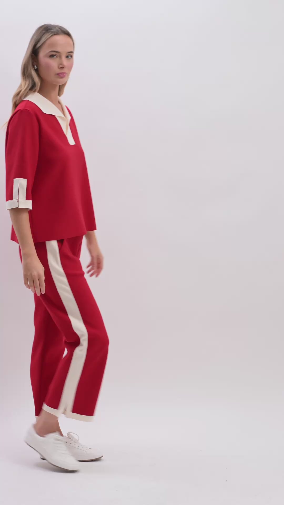 Katherine Top black women’s relaxed fit top with cream contrast collar and sleeve trim shown on model